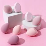 set of multi-colored, mini beauty makeup sponges in a plastic case - Image 2